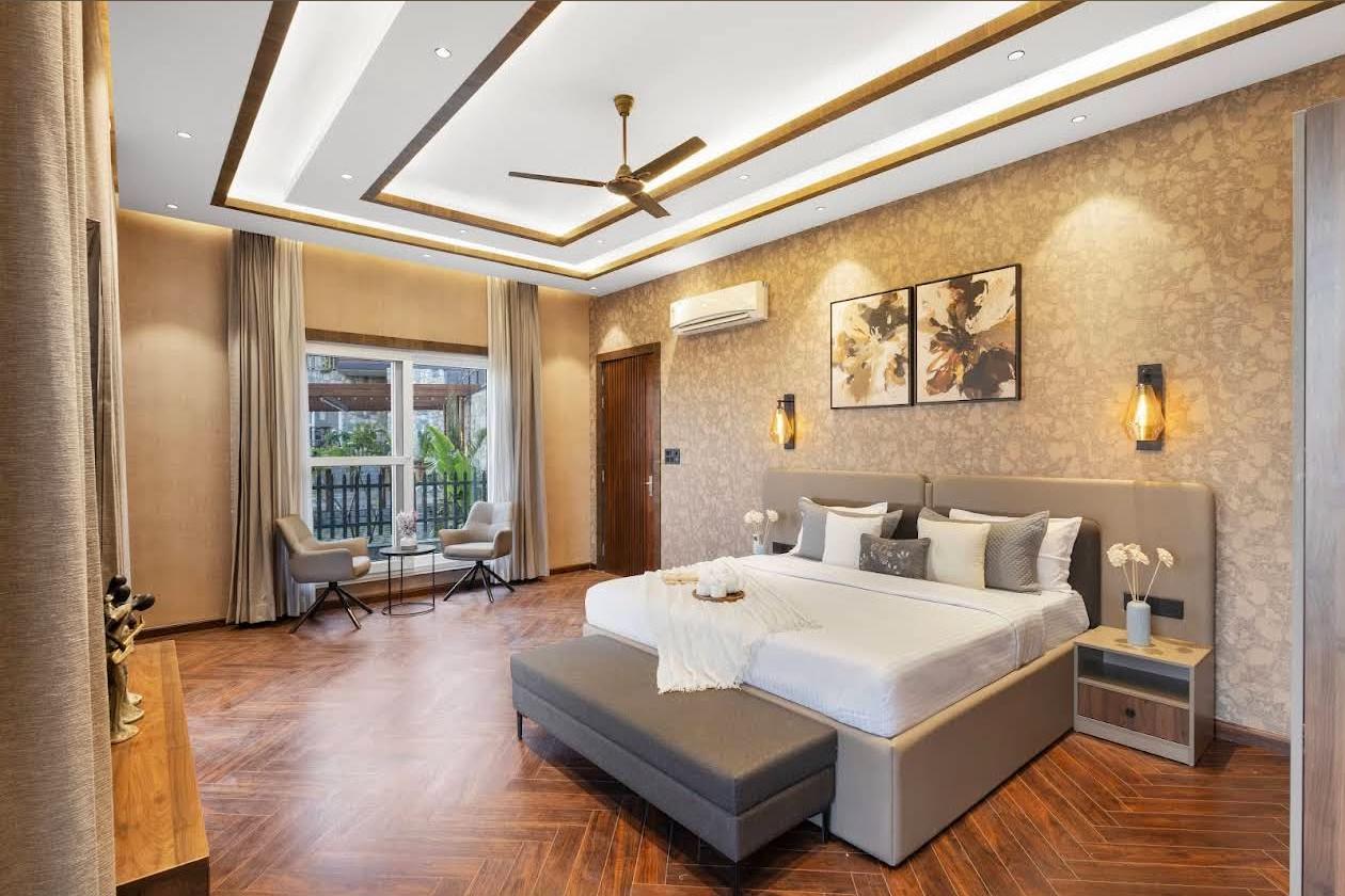 Elegant bedroom with gold accents and designer lighting