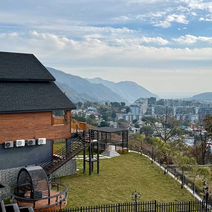 Hillcrest premium villa with lawn overlooking Dehradun city and Shivalik mountains